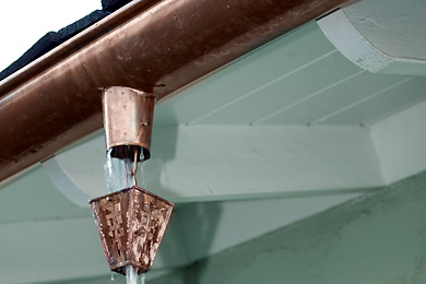 Custom copper gutter, downspout and rainchain