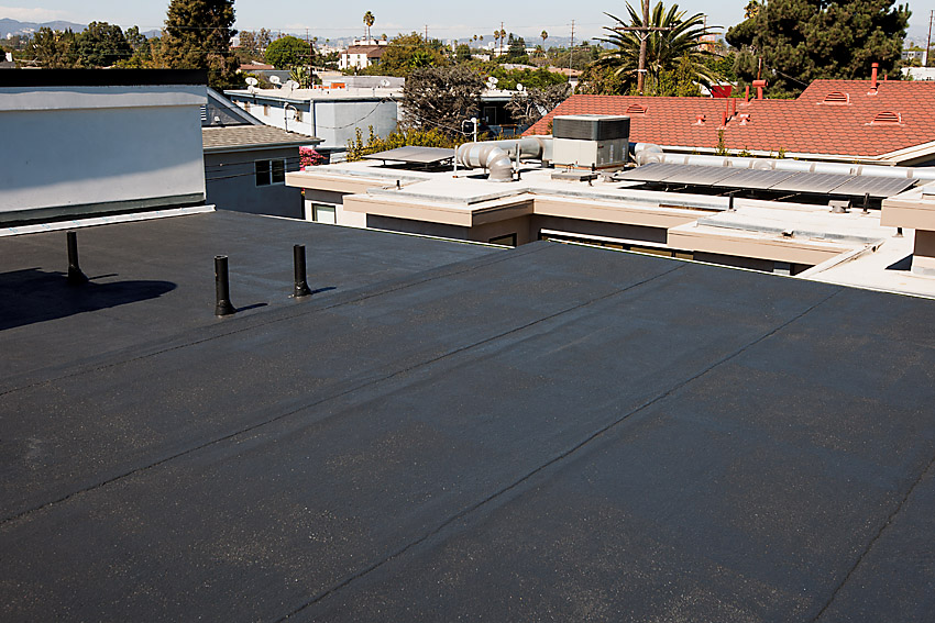 Flat roof with black coating