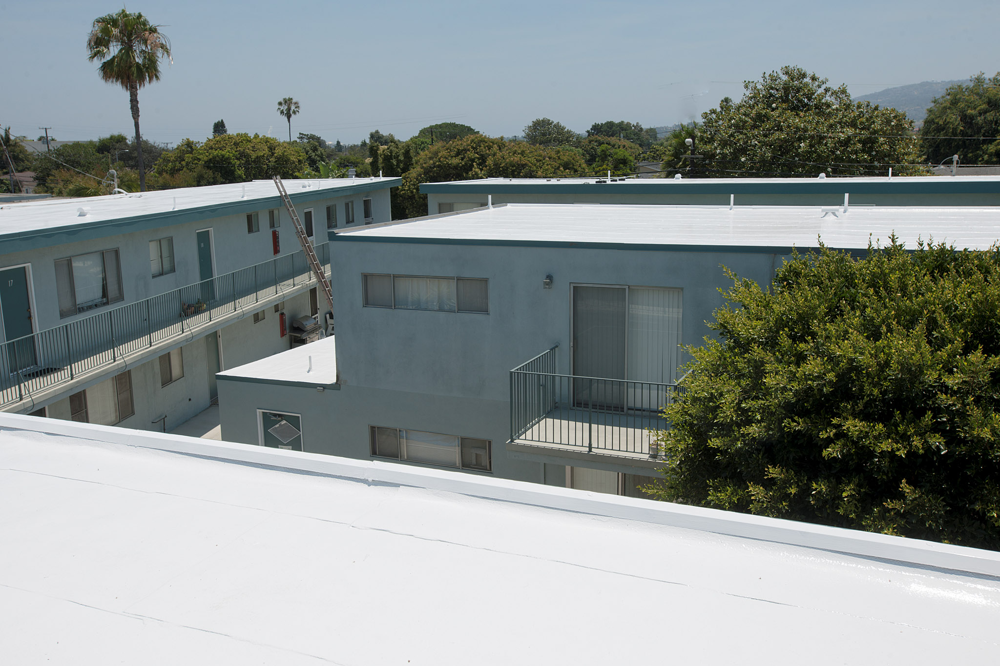 Navarro Roofing installs a Cool Roof on an apartment building in Torrance, California.